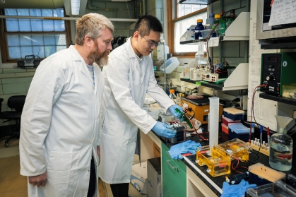 Jeff Boyd and graduate student in lab