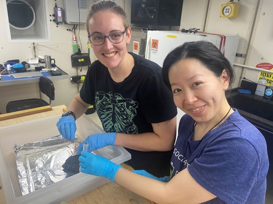 Olivia Cannon and Aila Inaba aboard research Vessel Atlantis