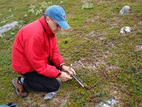 Taking samples in the field.